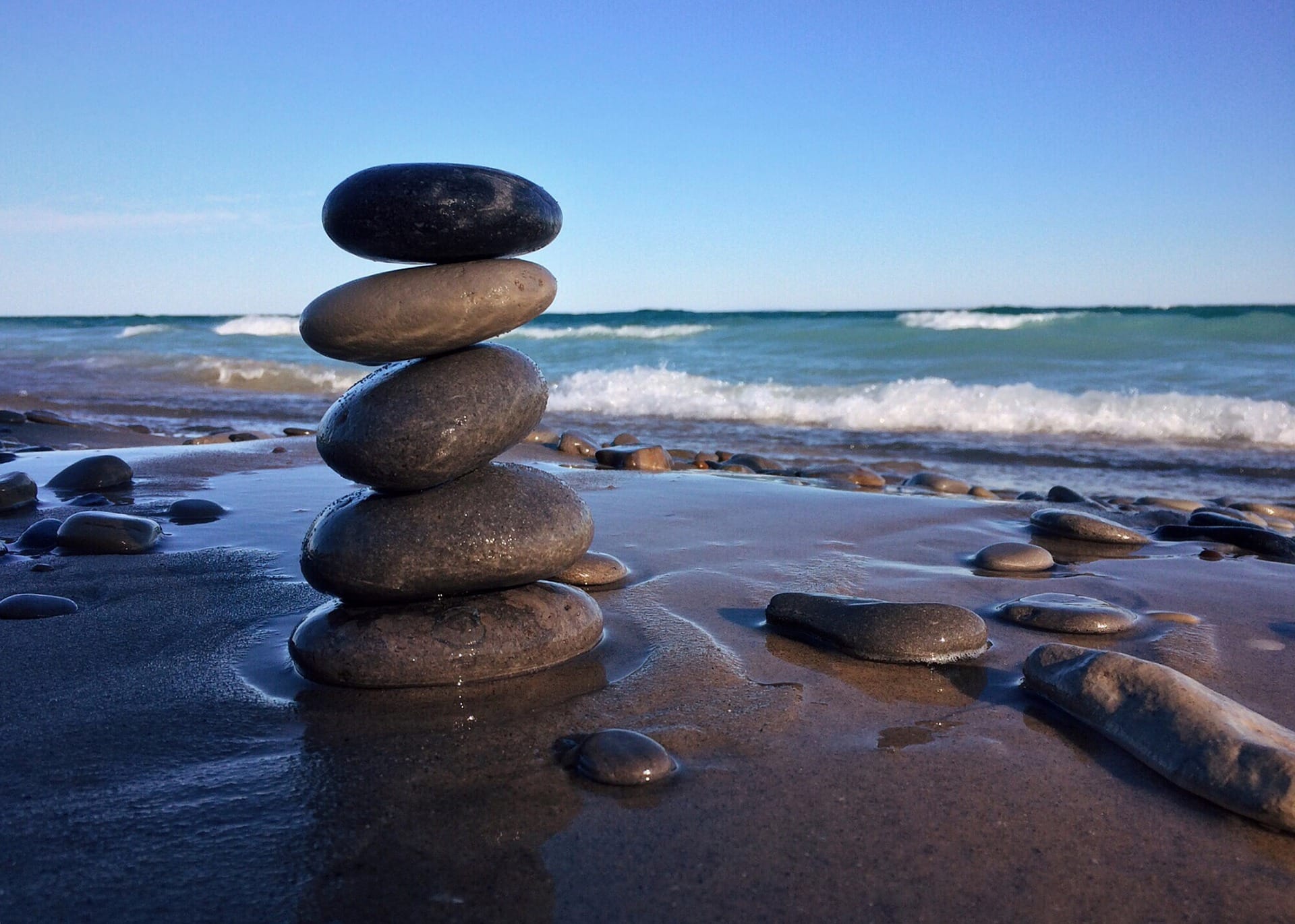 image balanced rocks on a beach