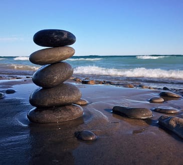 image balanced rocks on a beach